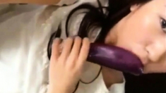 hot korean teen masturbates using eggplant